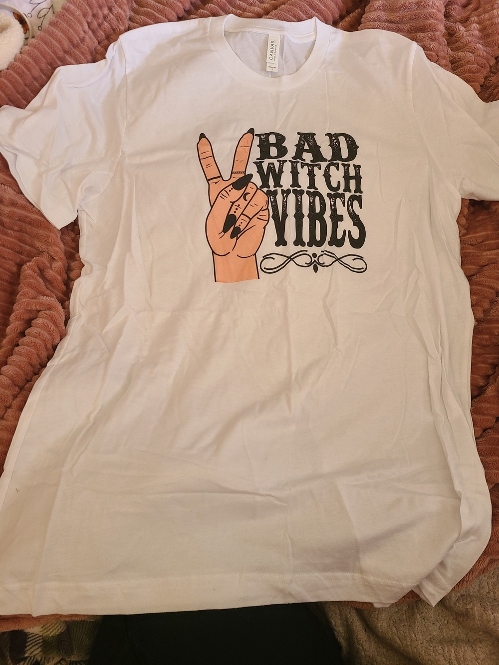 Bella Canvas White Tee with Peach Hand & Black 'Bad Witch Vibes' Graphic